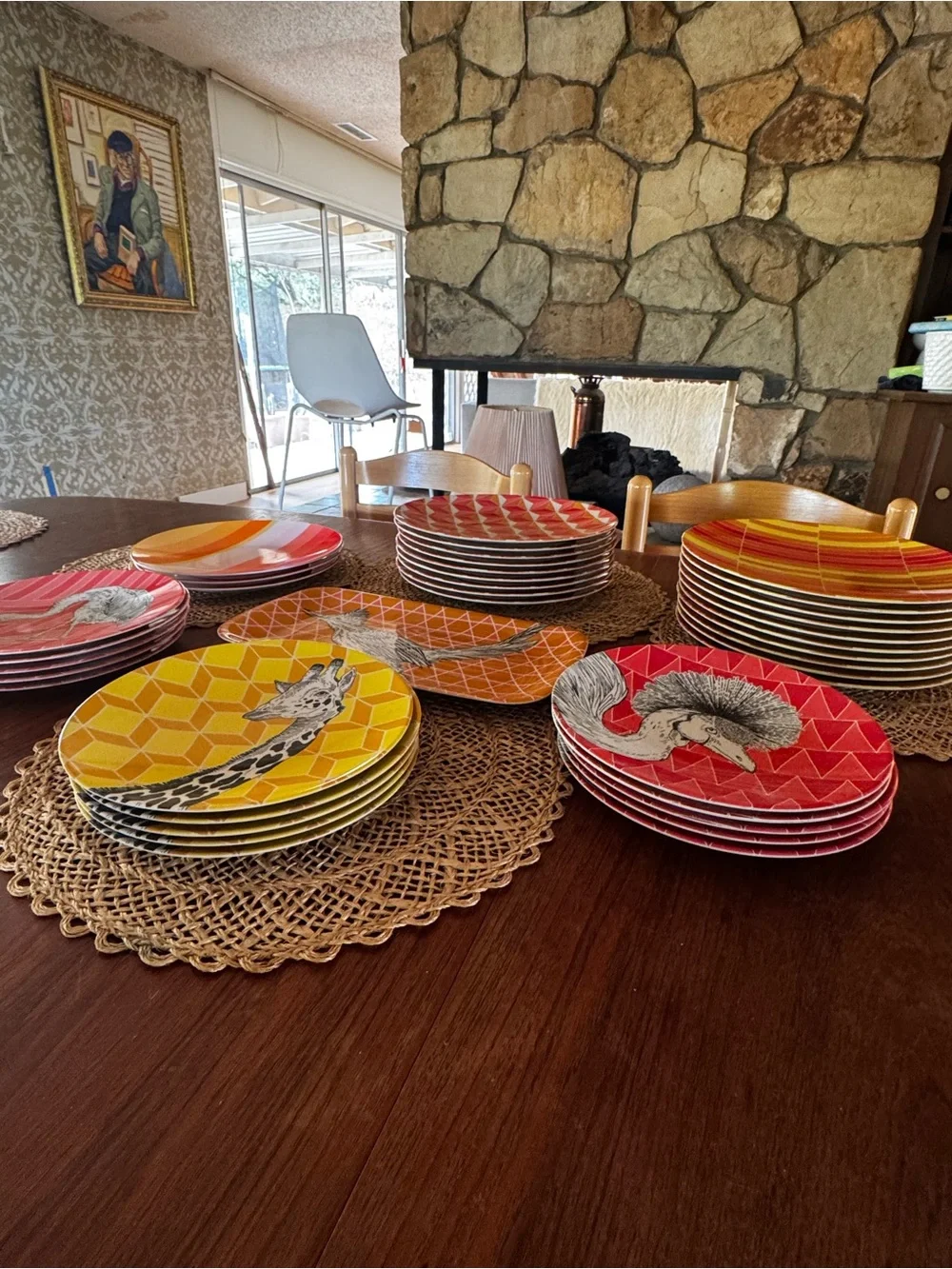 Set of 38 West Elm plates with colorful geometric prints & animal illustrations